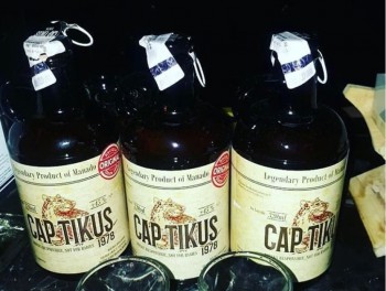 Minuman Keras Tradisional: Sopi & Cap Tikus Dilegalkan